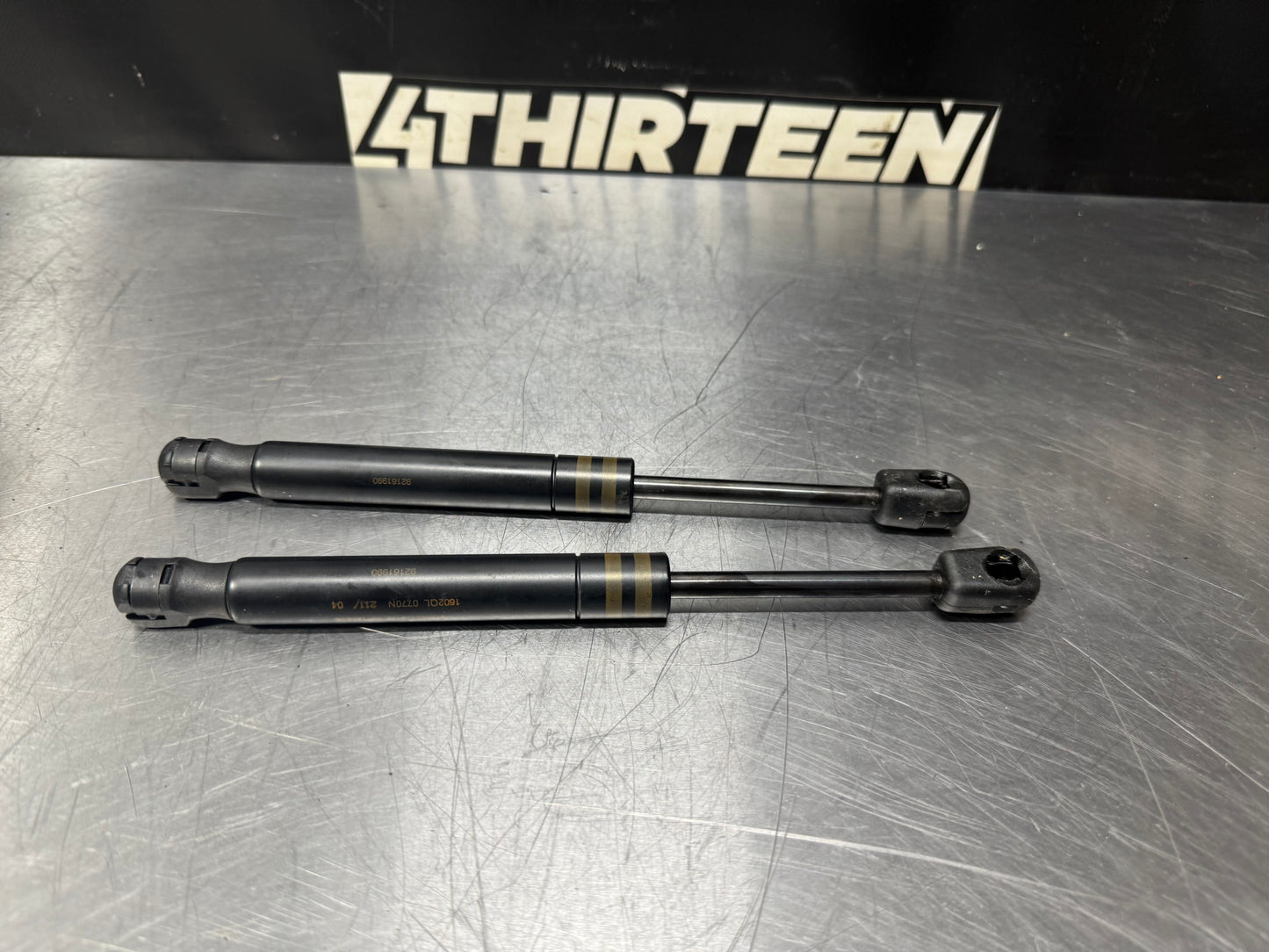 04-06 PONTIAC GTO REAR TRUNK SHOCK STRUTS OEM #L447