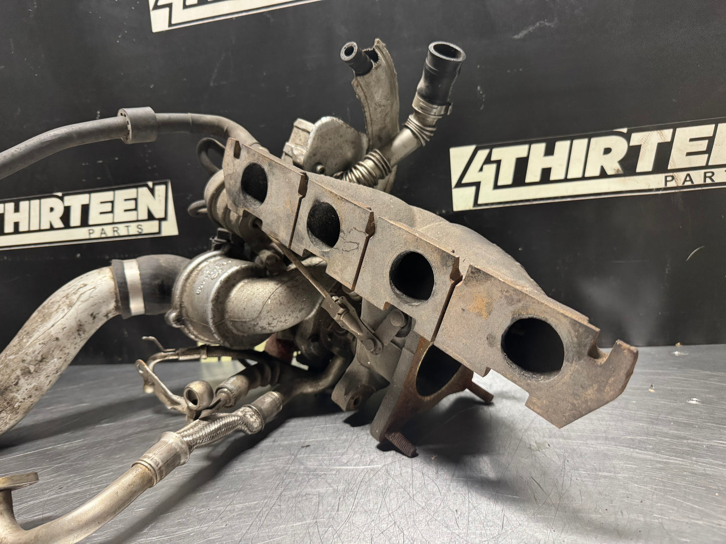 06-09 VOLKSWAGEN GOLF GTI EXHAUST MANIFOLD TURBO ASSEMBLY OEM #N506