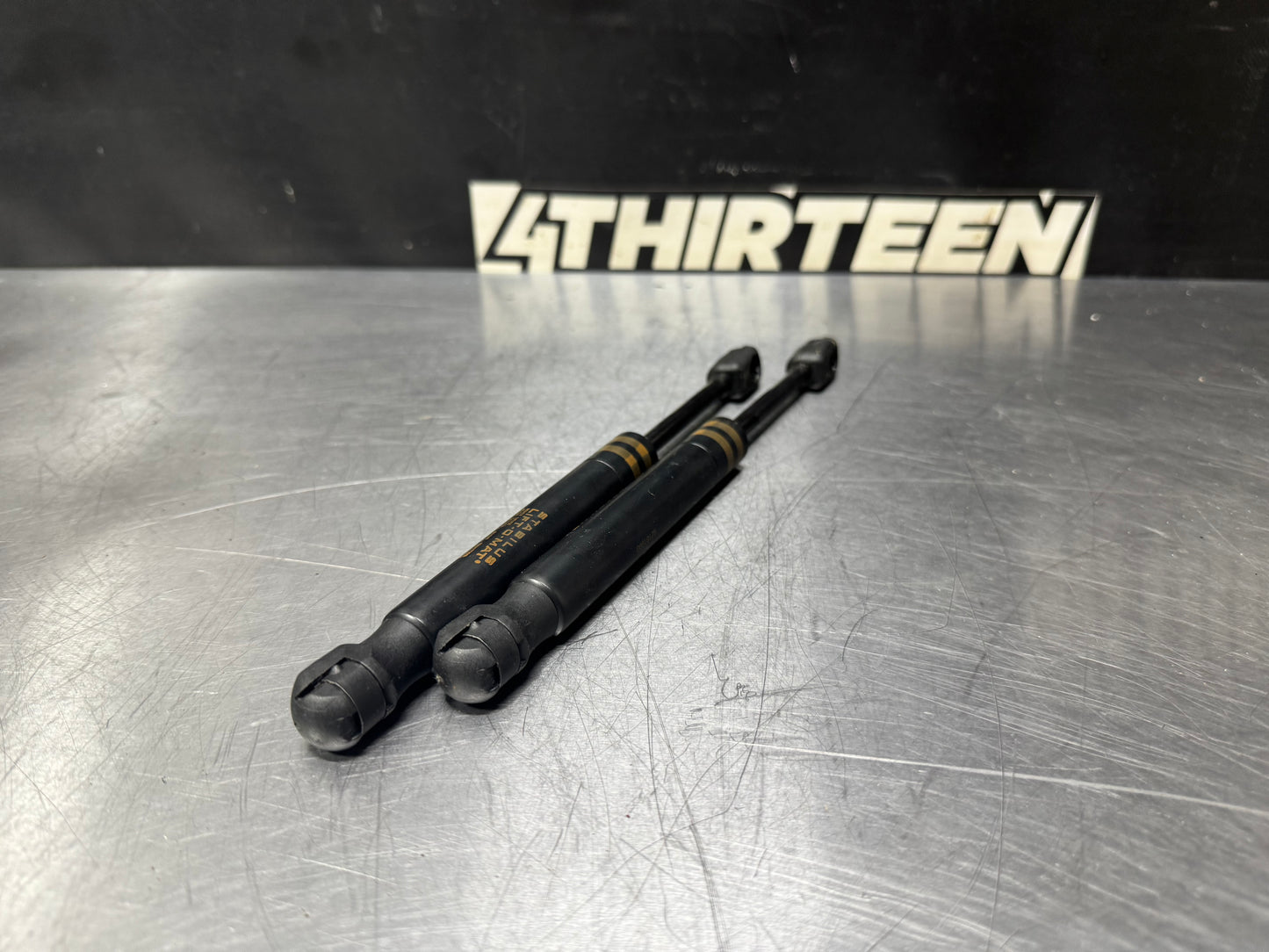 04-06 PONTIAC GTO REAR TRUNK SHOCK STRUTS OEM #L447