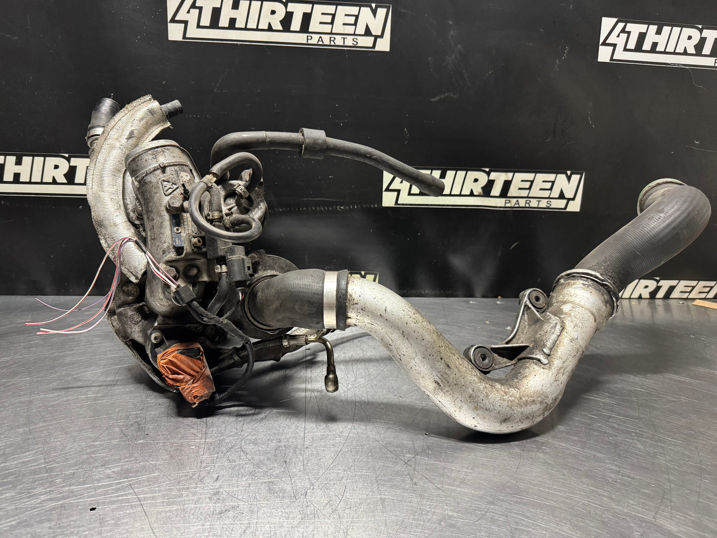 06-09 VOLKSWAGEN GOLF GTI EXHAUST MANIFOLD TURBO ASSEMBLY OEM #N506
