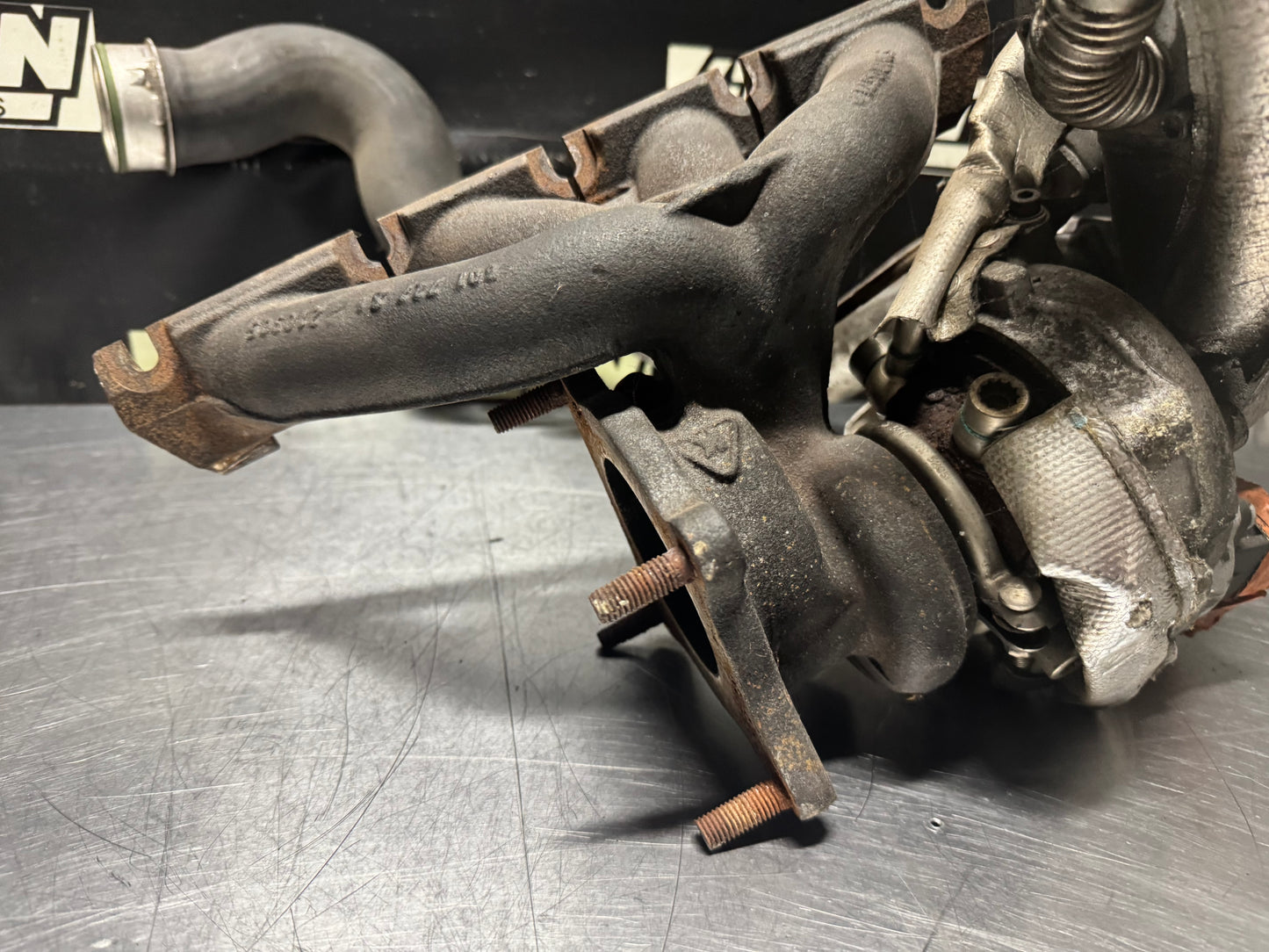 06-09 VOLKSWAGEN GOLF GTI EXHAUST MANIFOLD TURBO ASSEMBLY OEM #N506