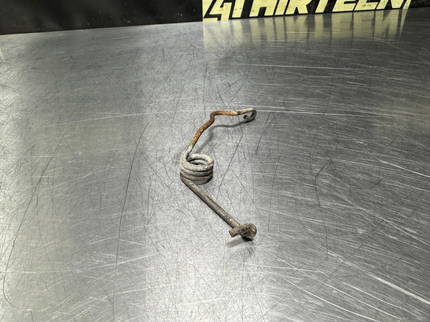 04-06 PONTIAC GTO HOOD LATCH SPRING OEM #N625