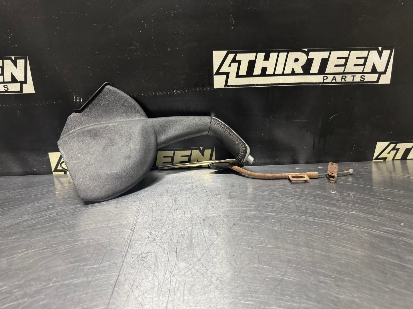 04-06 PONTIAC GTO EMERGENCY BRAKE HANDLE RED STITCHING OEM #N405