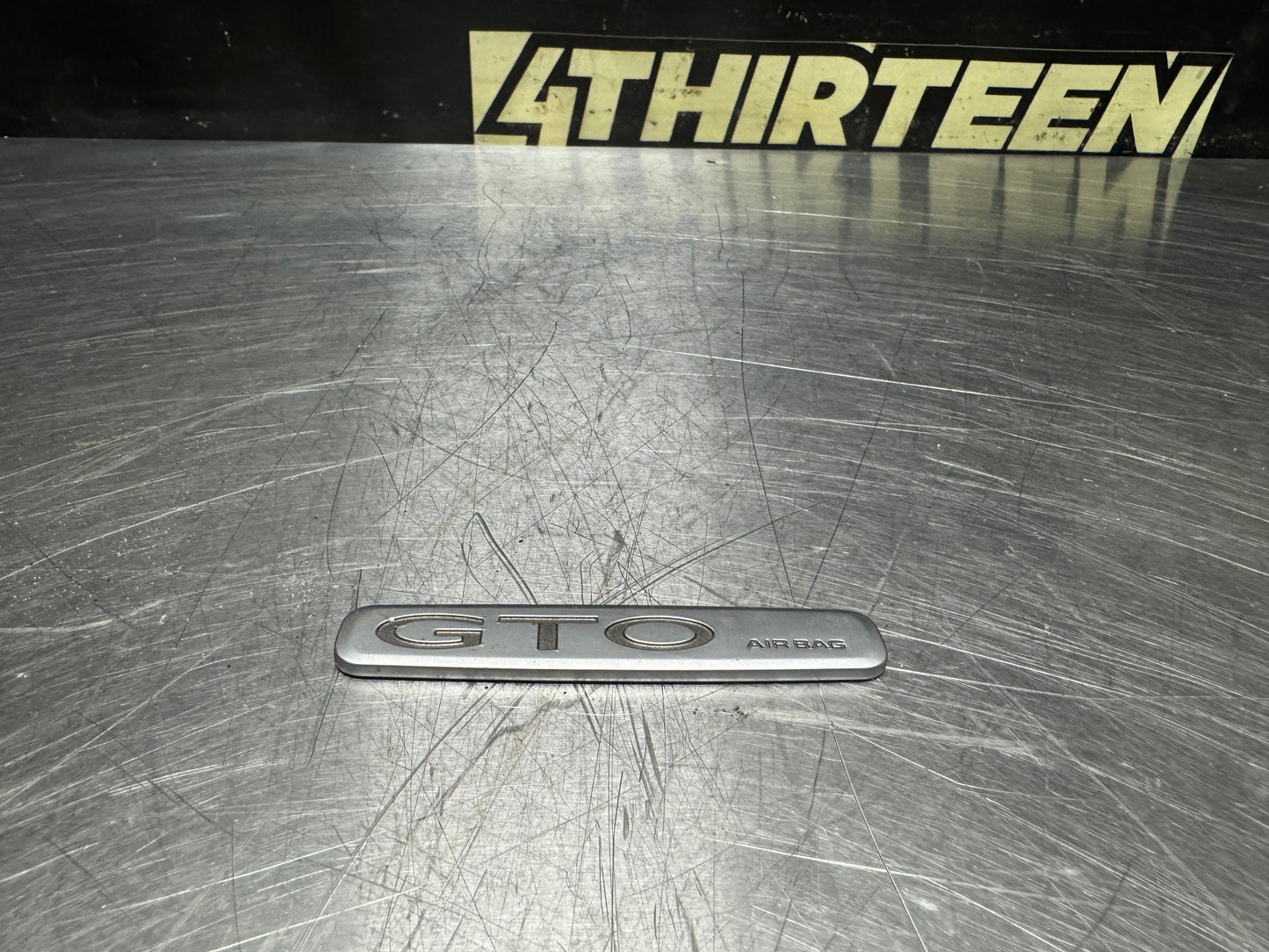 04-06 PONTIAC GTO DASH AIR BAG EMBLEM OEM #N644