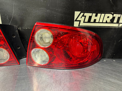 2004 PONTIAC GTO REAR TAIL LIGHTS OEM #V56