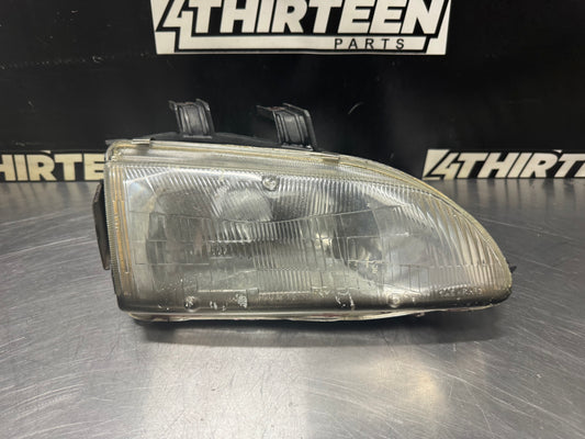 92-95 HONDA CIVIC COUPE/HATCHBACK RH PASSENGER STANLEY GLASS HEADLIGHT OEM #N211