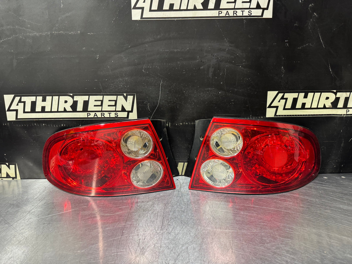 2004 PONTIAC GTO REAR TAIL LIGHTS OEM #V56
