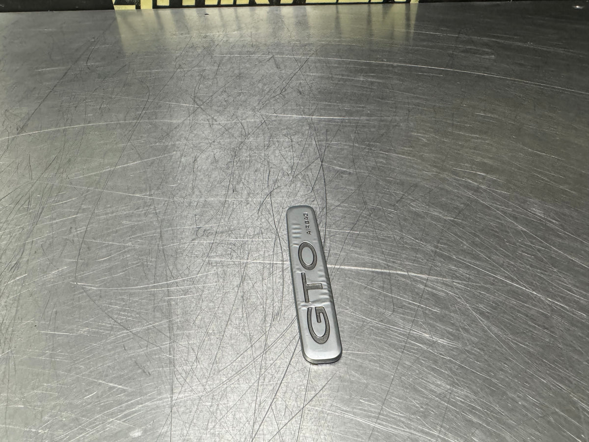 04-06 PONTIAC GTO DASH EMBLEM OEM #N947