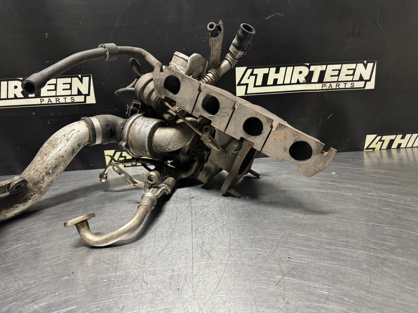 06-09 VOLKSWAGEN GOLF GTI EXHAUST MANIFOLD TURBO ASSEMBLY OEM #N506