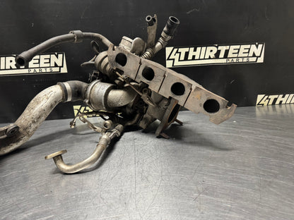 06-09 VOLKSWAGEN GOLF GTI EXHAUST MANIFOLD TURBO ASSEMBLY OEM #N506