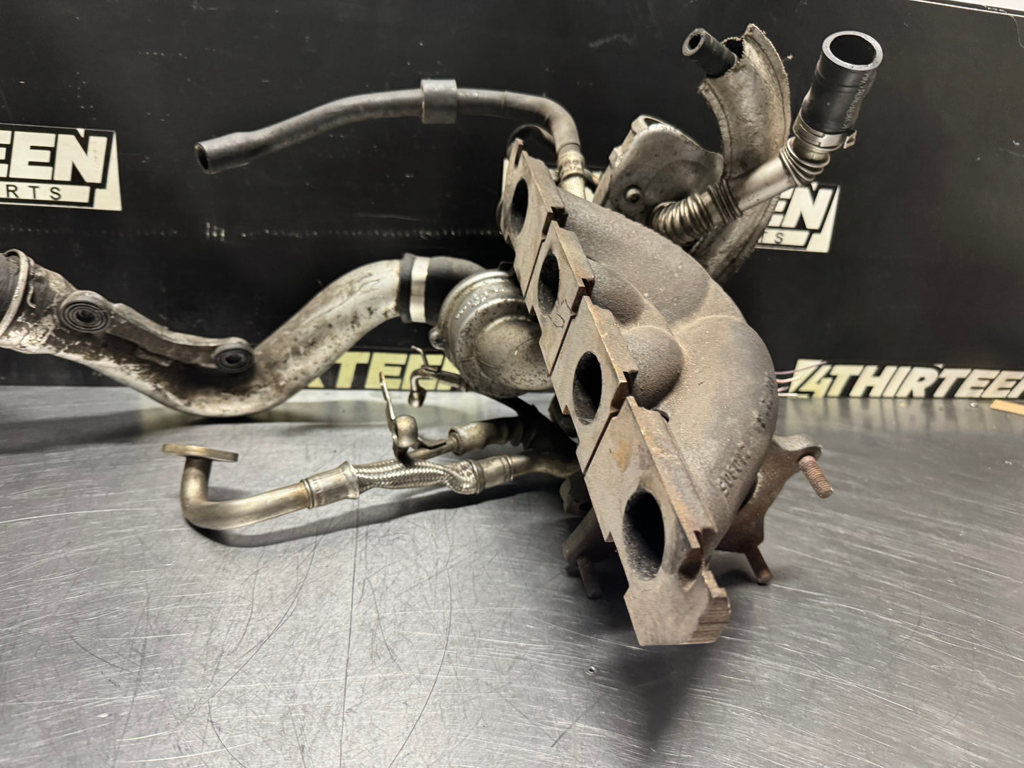 06-09 VOLKSWAGEN GOLF GTI EXHAUST MANIFOLD TURBO ASSEMBLY OEM #N506