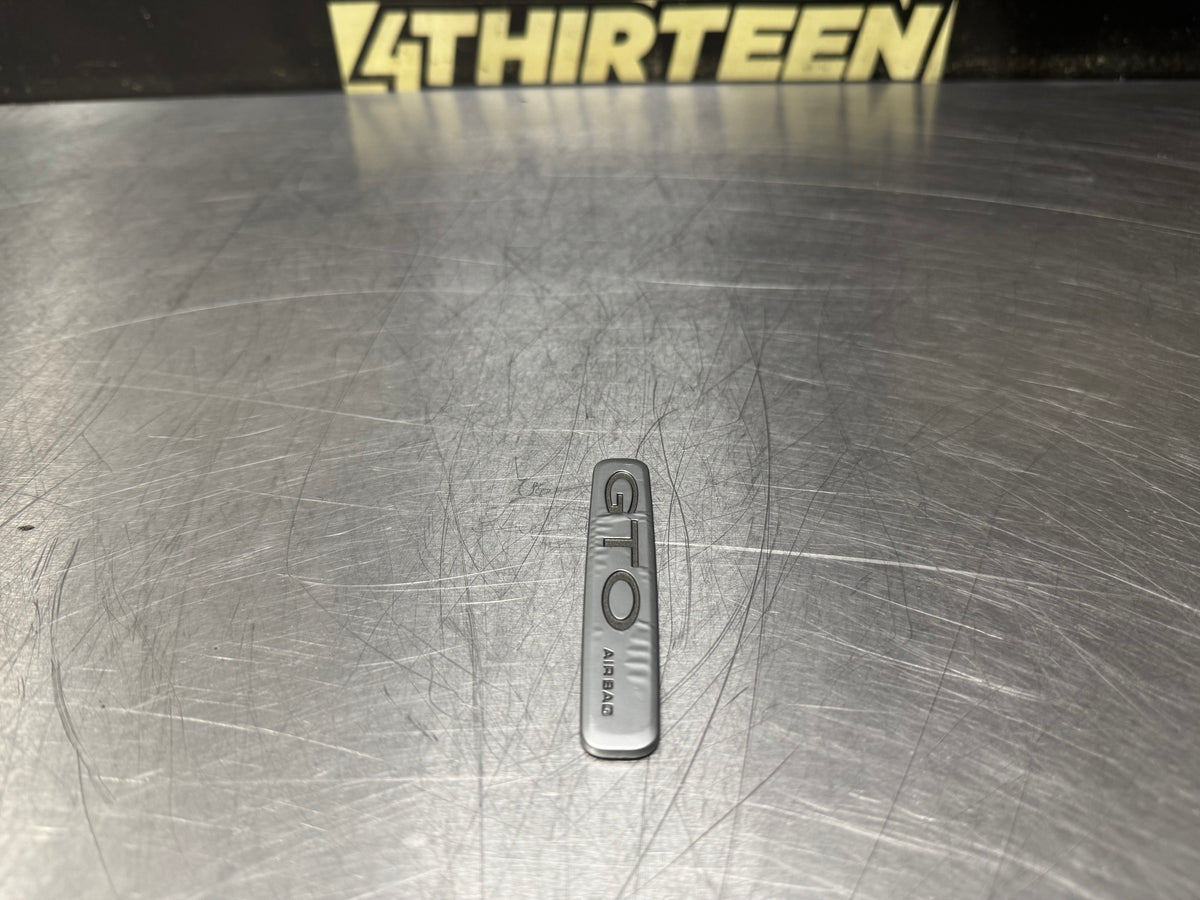 04-06 PONTIAC GTO DASH EMBLEM OEM #N947