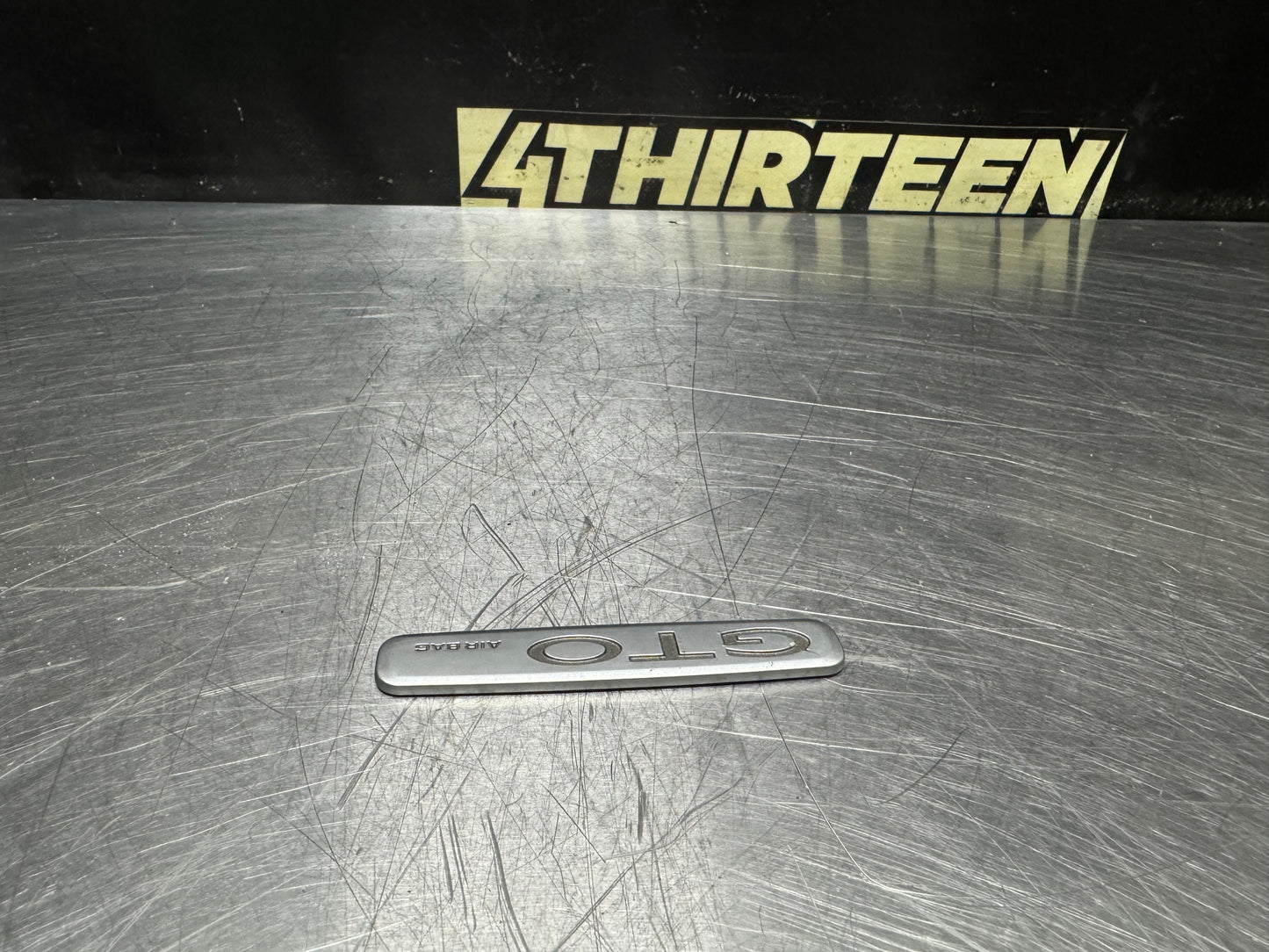 04-06 PONTIAC GTO DASH AIR BAG EMBLEM OEM #N644