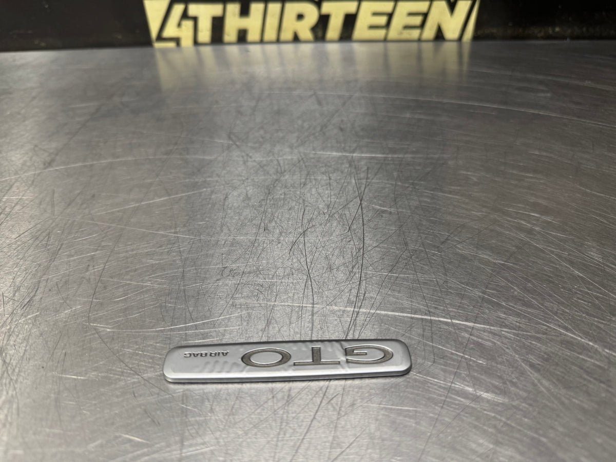 04-06 PONTIAC GTO DASH EMBLEM OEM #N947