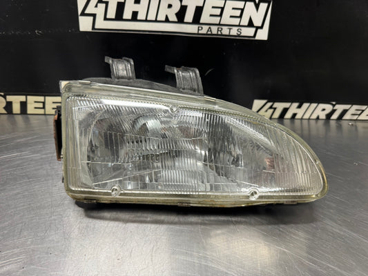 92-95 HONDA CIVIC COUPE/HATCHBACK RH PASSENGER STANLEY GLASS HEADLIGHT OEM #N209