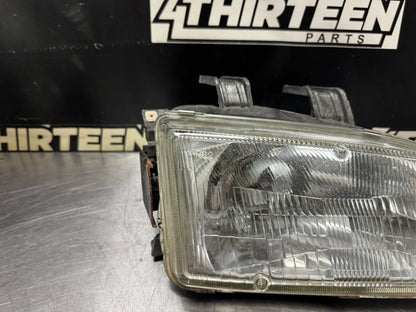 92-95 HONDA CIVIC COUPE/HATCHBACK RH PASSENGER STANLEY GLASS HEADLIGHT OEM #N209