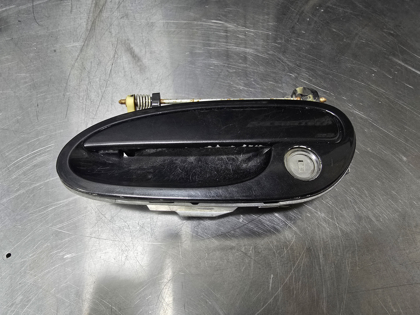 04-06 PONTIAC GTO LH DRIVER SIDE EXTERIOR DOOR HANDLE BLK OEM #N1