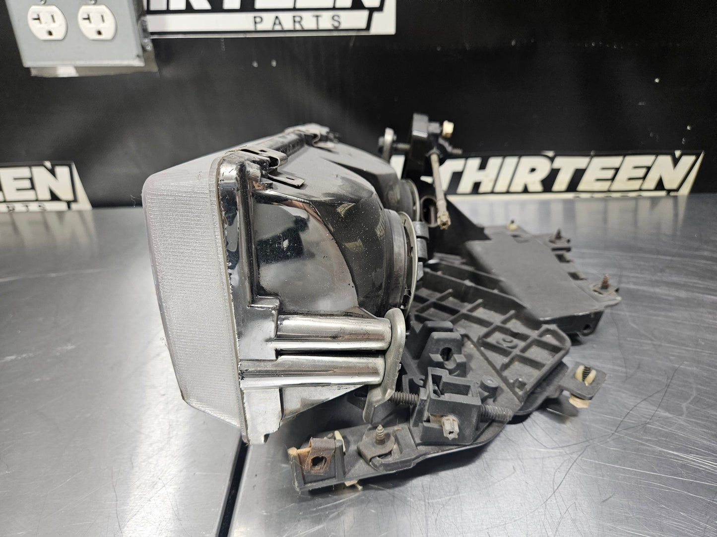 97-04 CORVETTE C5 LH DRIVER HEADLIGHT BRACKET INCOMPLETE #N880
